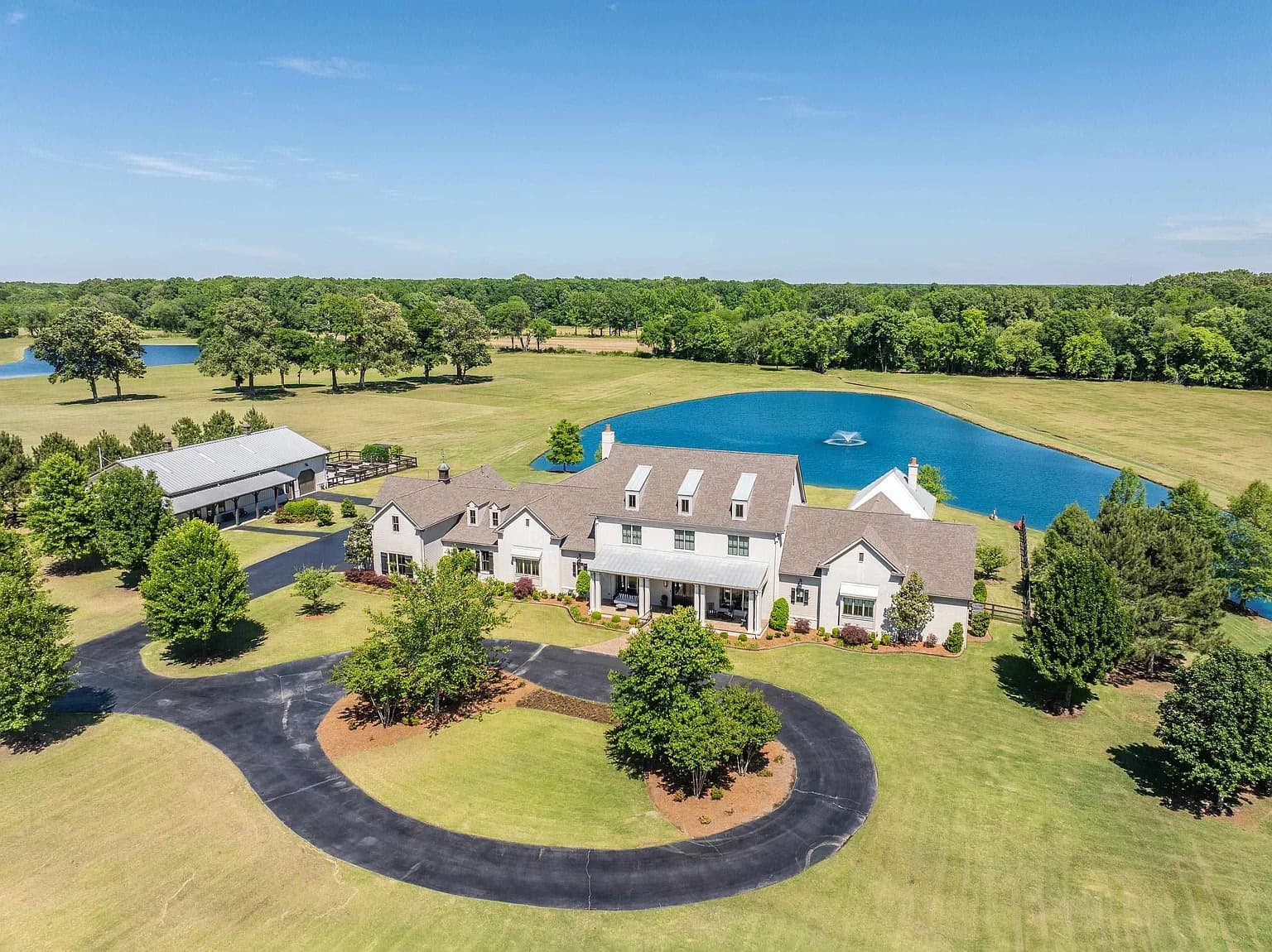 20-Acre Gated Farmhouse Estate Near Memphis with Private Lake